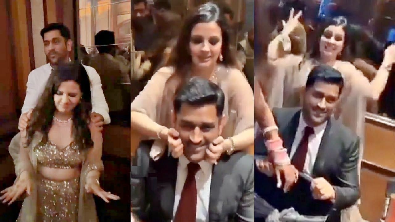 The former India captain with wife Sakshi.